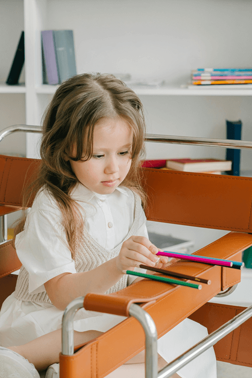 Girl organizing pencils
